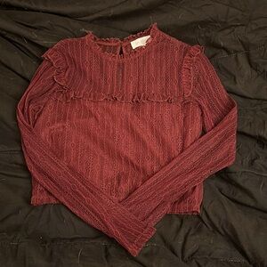 Red long sleeved top